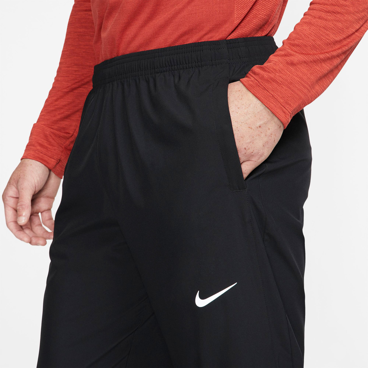 Nike track pants stripe store