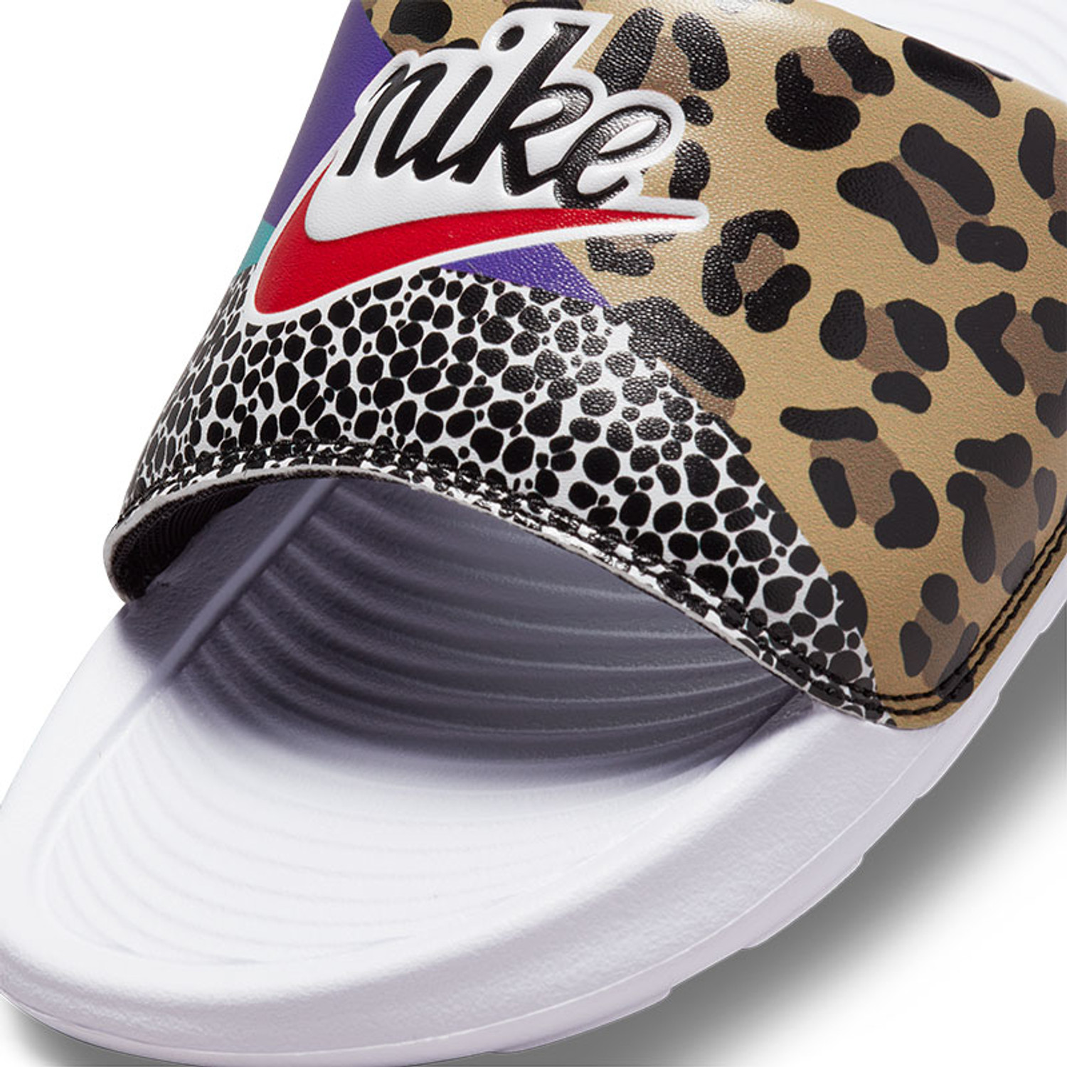 Nike leopard sliders top