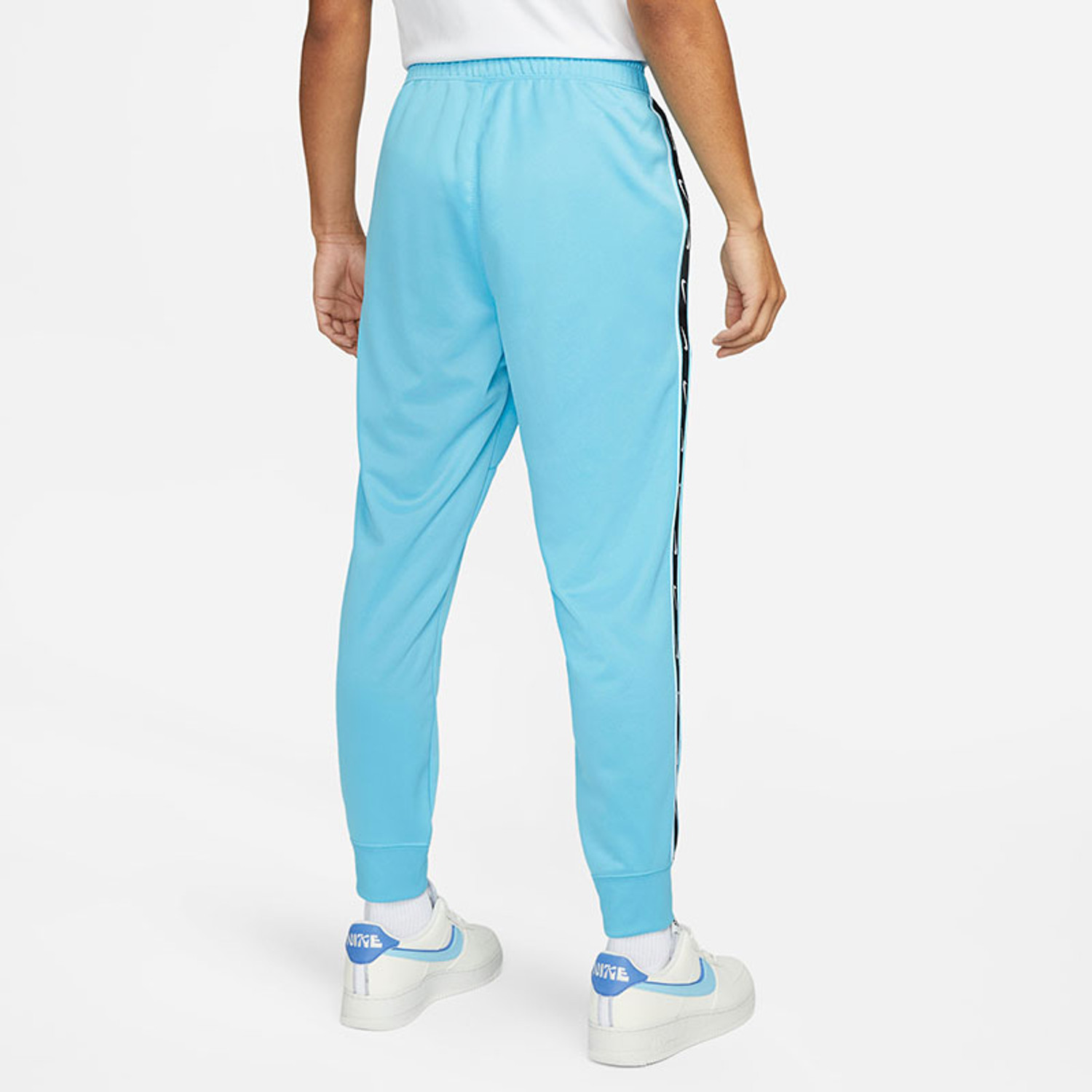 Nike repeat logo track pants hotsell